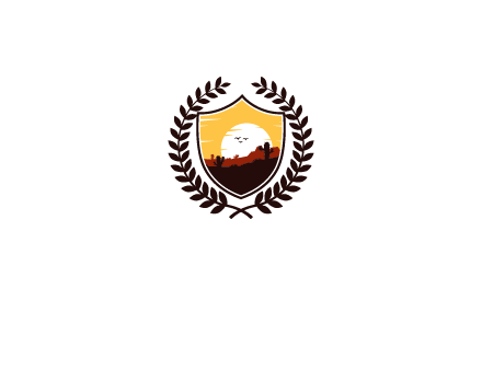 desert and setting sun inside a badge shaped vector surrounded by a wreath